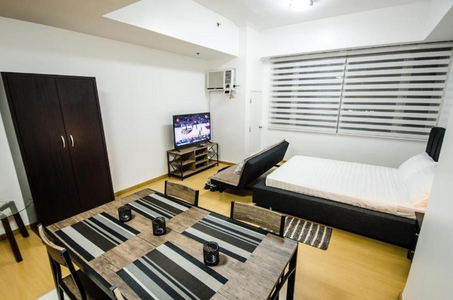 Prime Avant Bgc Location Apartments By Ph Staycation Manila Zewnętrze zdjęcie